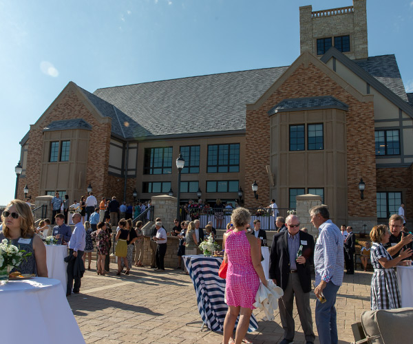 An outdoor event at the Sanford House