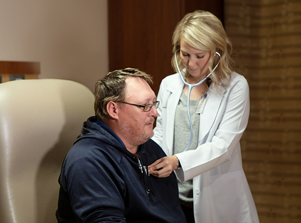 a patient getting his heart checked
