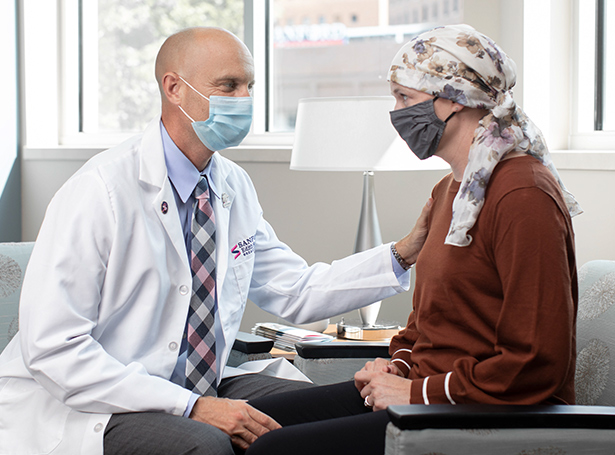a doctor talking to his patient