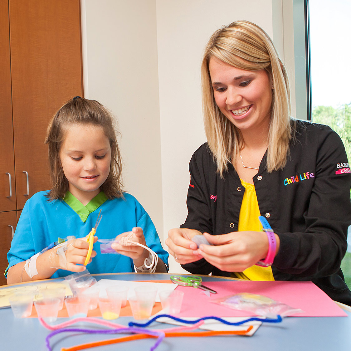 Child with Child Life Specialist