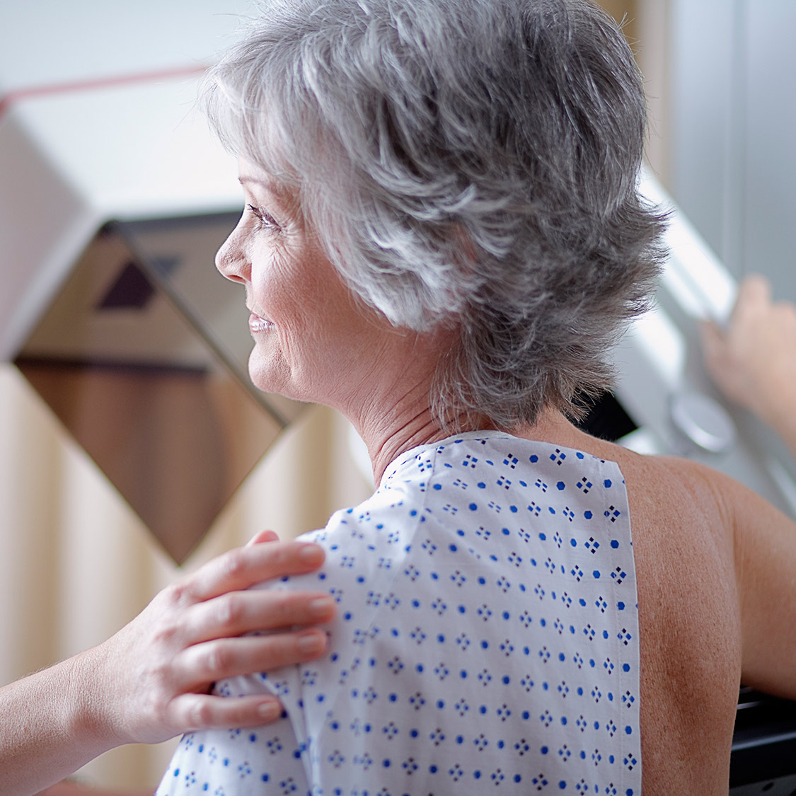 Patient receiving a mammogram