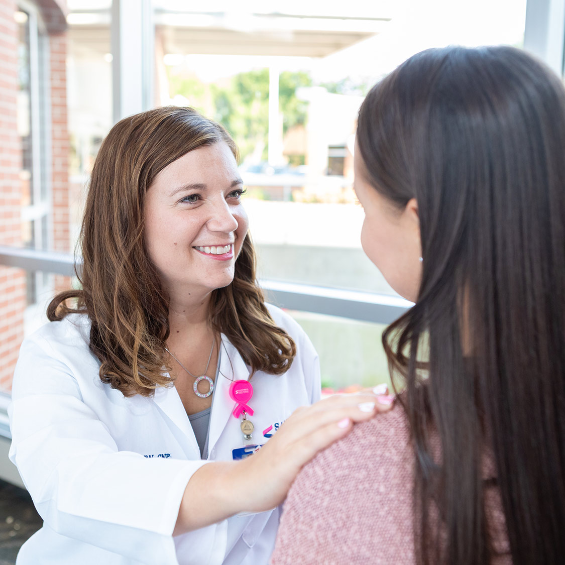 Nurse navigator with breast cancer patient